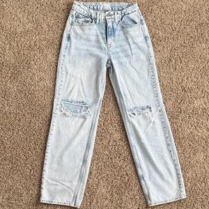 Good American The Good 90’s Relaxed Light Blue Distressed Jeans